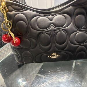 Coach Black Embossed Shoulder Bag with Red Charm